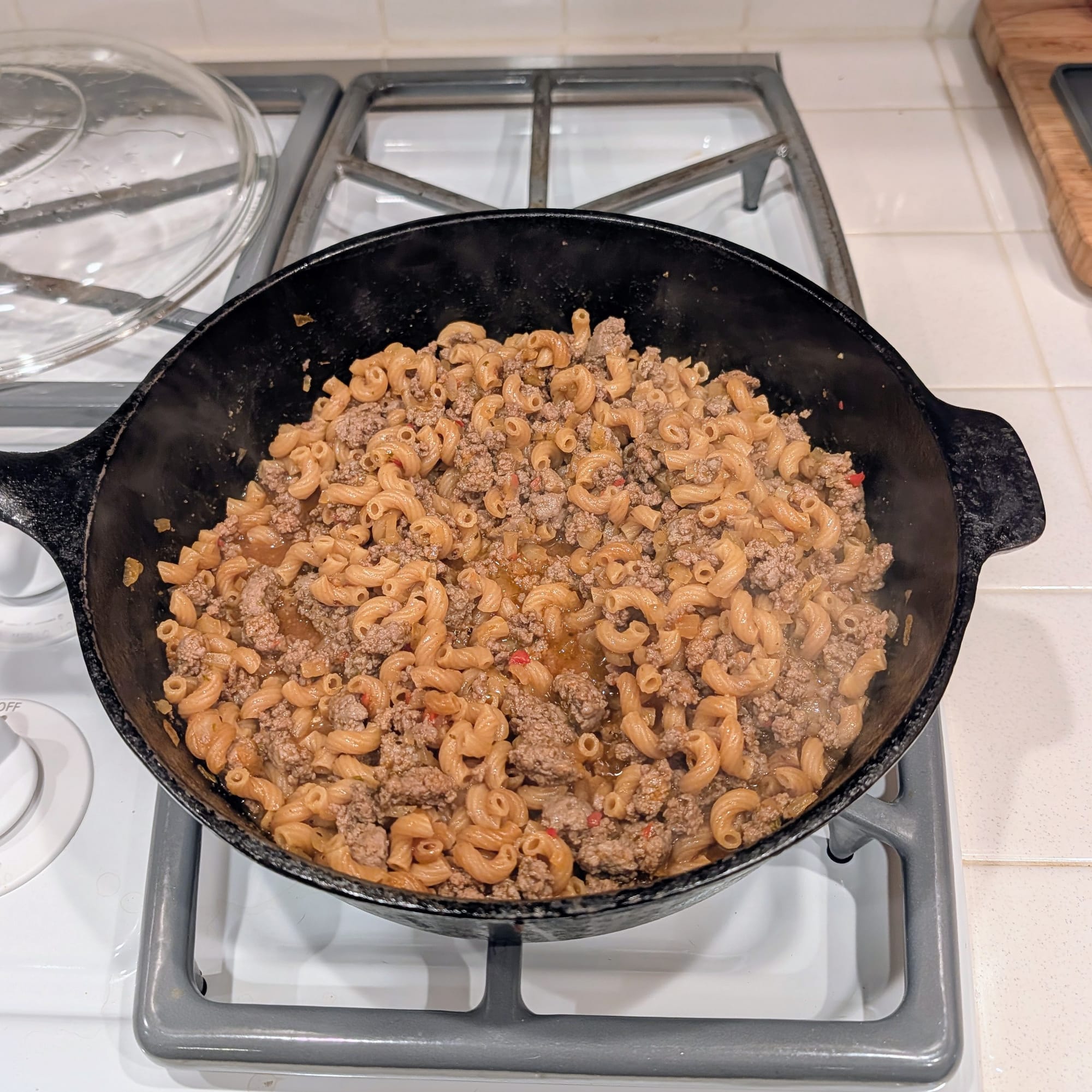 My high sided black iron skillet is perfect for cooking this dish and makes this cooking action shot look good.