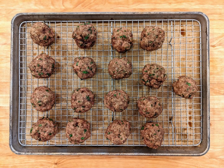 Anne's Meatballs fresh from the oven and ready finish off simmering in some Americanara Sauce.