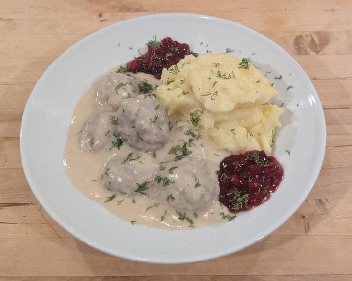 Swedish meatballs with lingonberries and mashed potatoes looking better then IKEA's.