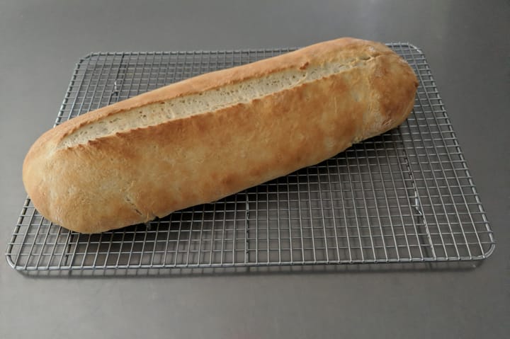 Fresh loaf of Cuban Bread out of the oven cooling and getting ready to make an awesome sandwich.