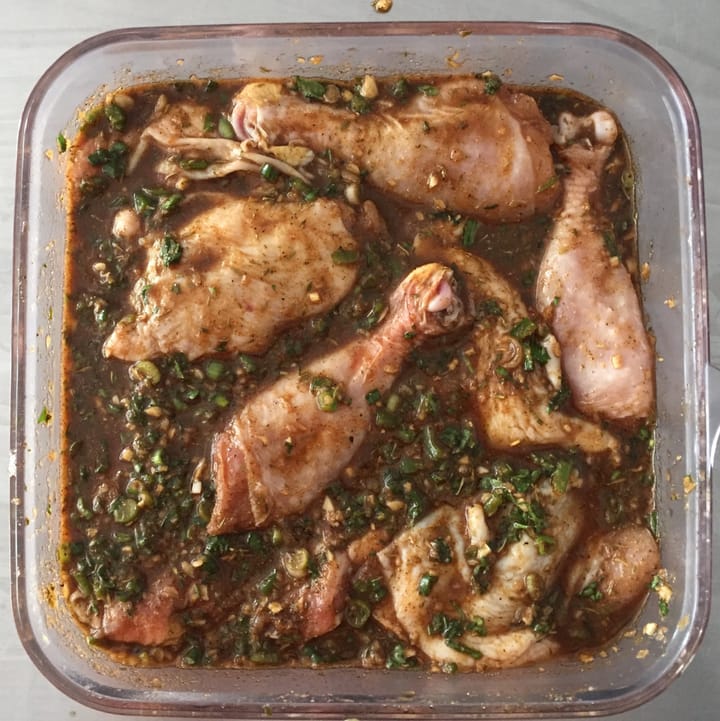Jerk Chicken marinading in a bath of spicy goodness.