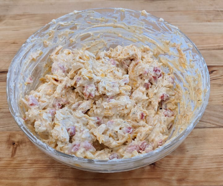 This picture does not give it justice. Make no mistake about it this bowl of Pimento Cheese Spread is gone before the camera is down.