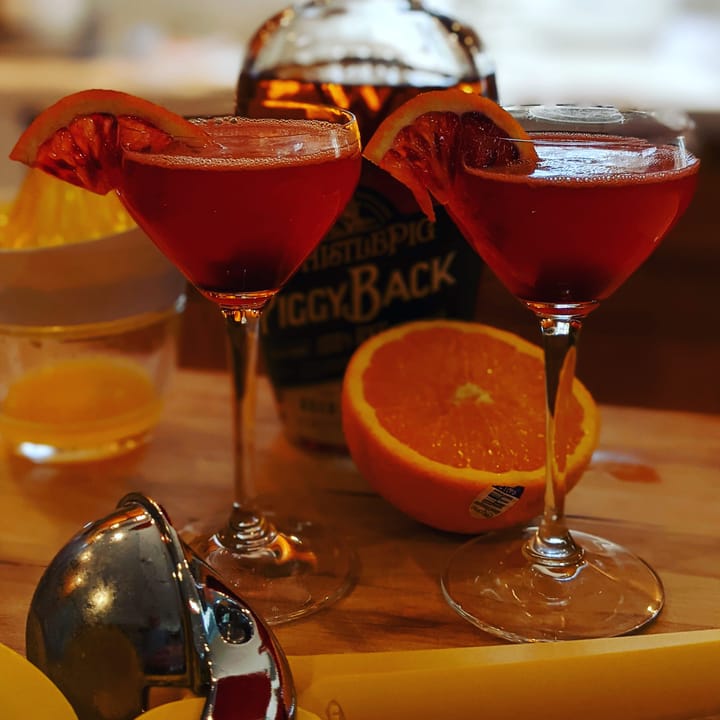 Blood orange slice adds extra class to an already classy beverage.