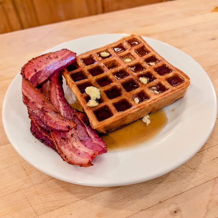 A Yeasted Belgian Waffle with copious amounts of butter, Stoysich bacon and Potter Family Maple syrup. My morning just got better!